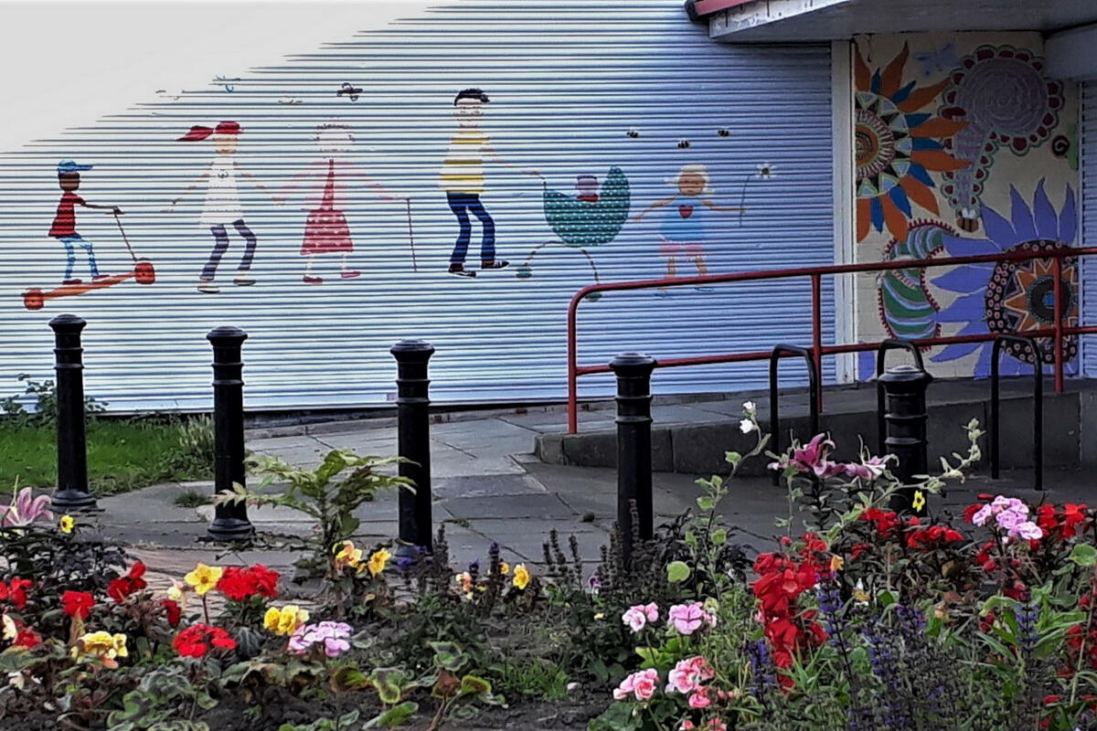 Painted shutter and wall art at Westminster Community Centre, Ellesmere Port.